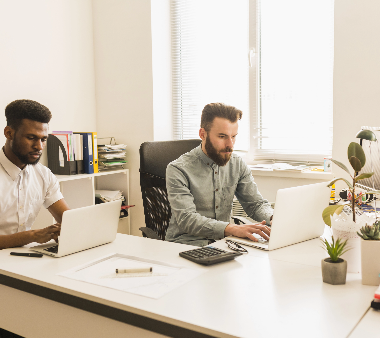 men-working-laptops