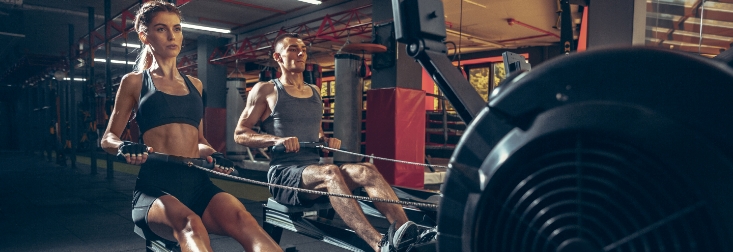 beautiful-young-sporty-couple-workout-gym-together-caucasian-man-training-with-female-trainer